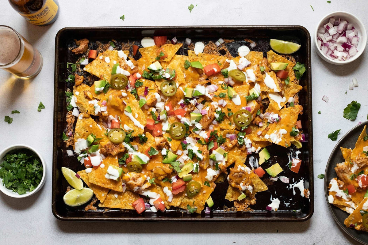 Spicy Fish Taco-Nachos with Lime Crema