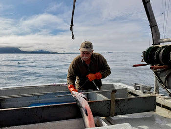 Man holding a salmon