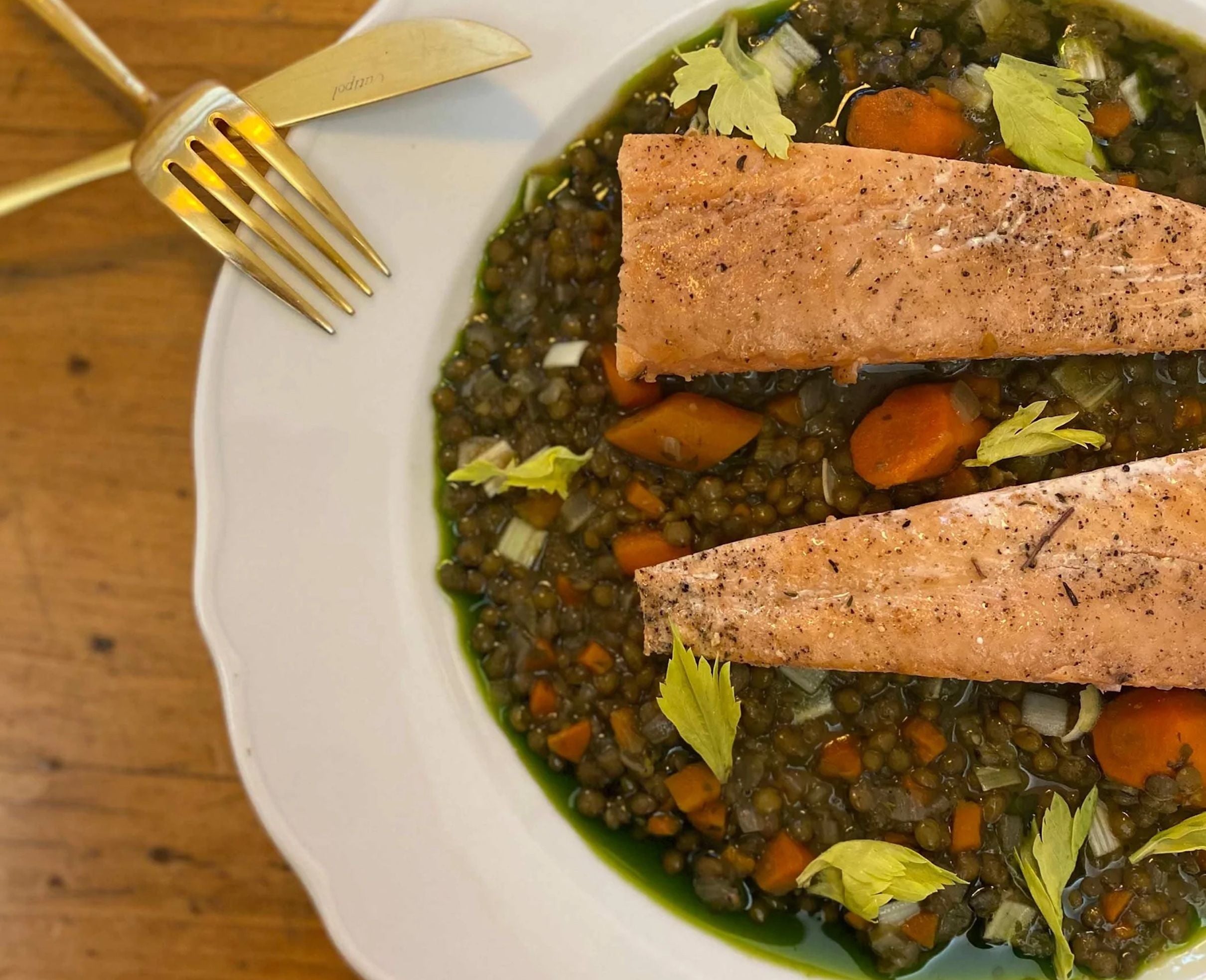 Sautéed Salmon with French Lentils, Celery Leaves and Herb Infused Olive Oil
