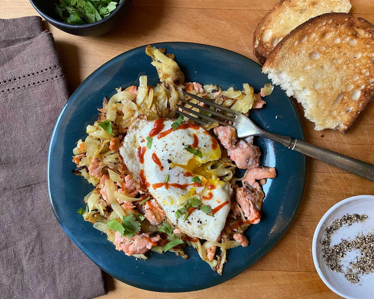 Salmon-Potato Hash Browns with Fried Eggs and Hot Sauce